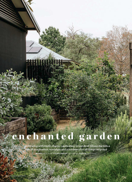 Garden scene with text overlay 'enchanted garden' 
